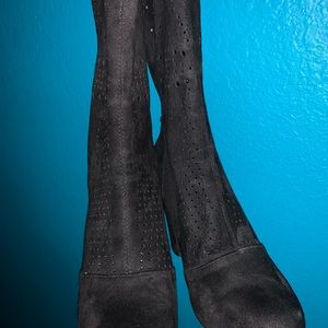 Black thigh high boots